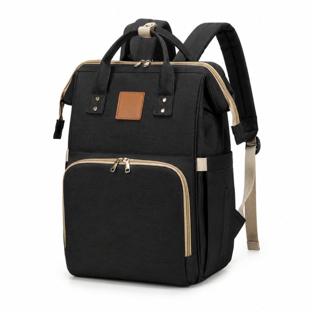 Black backpack with brown leather patch on a white background
